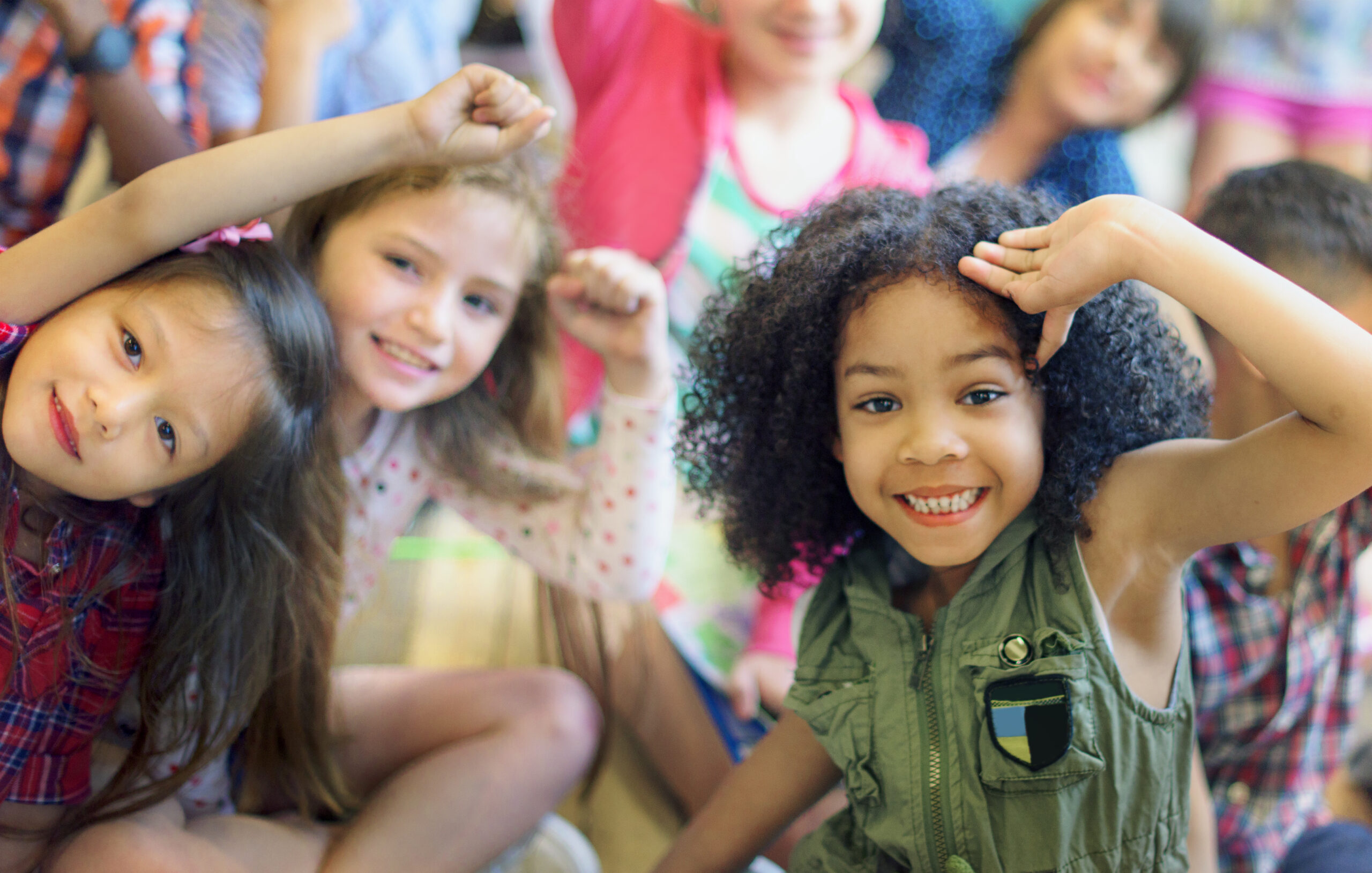 happy diverse young school kids scaled